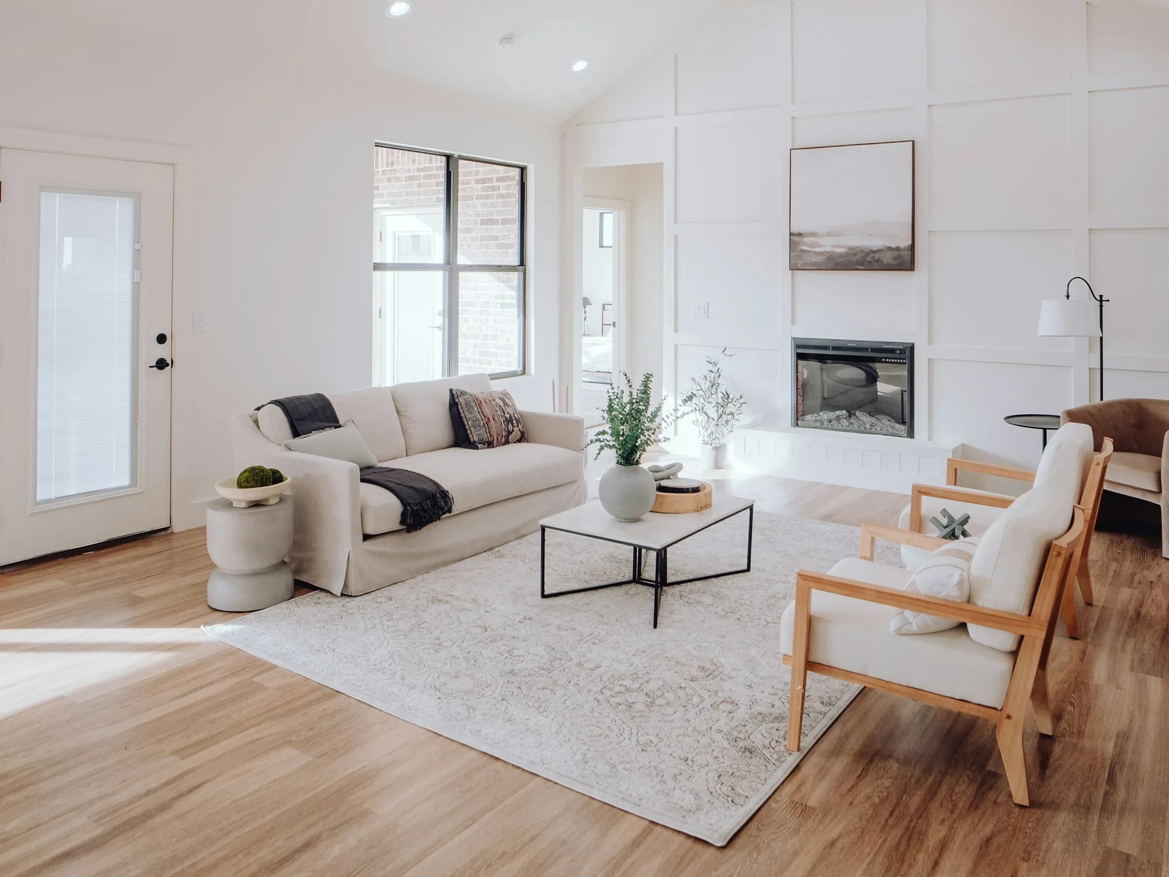 Sunlit, spotless Orlando vacation rental living room staged and ready for the next guest